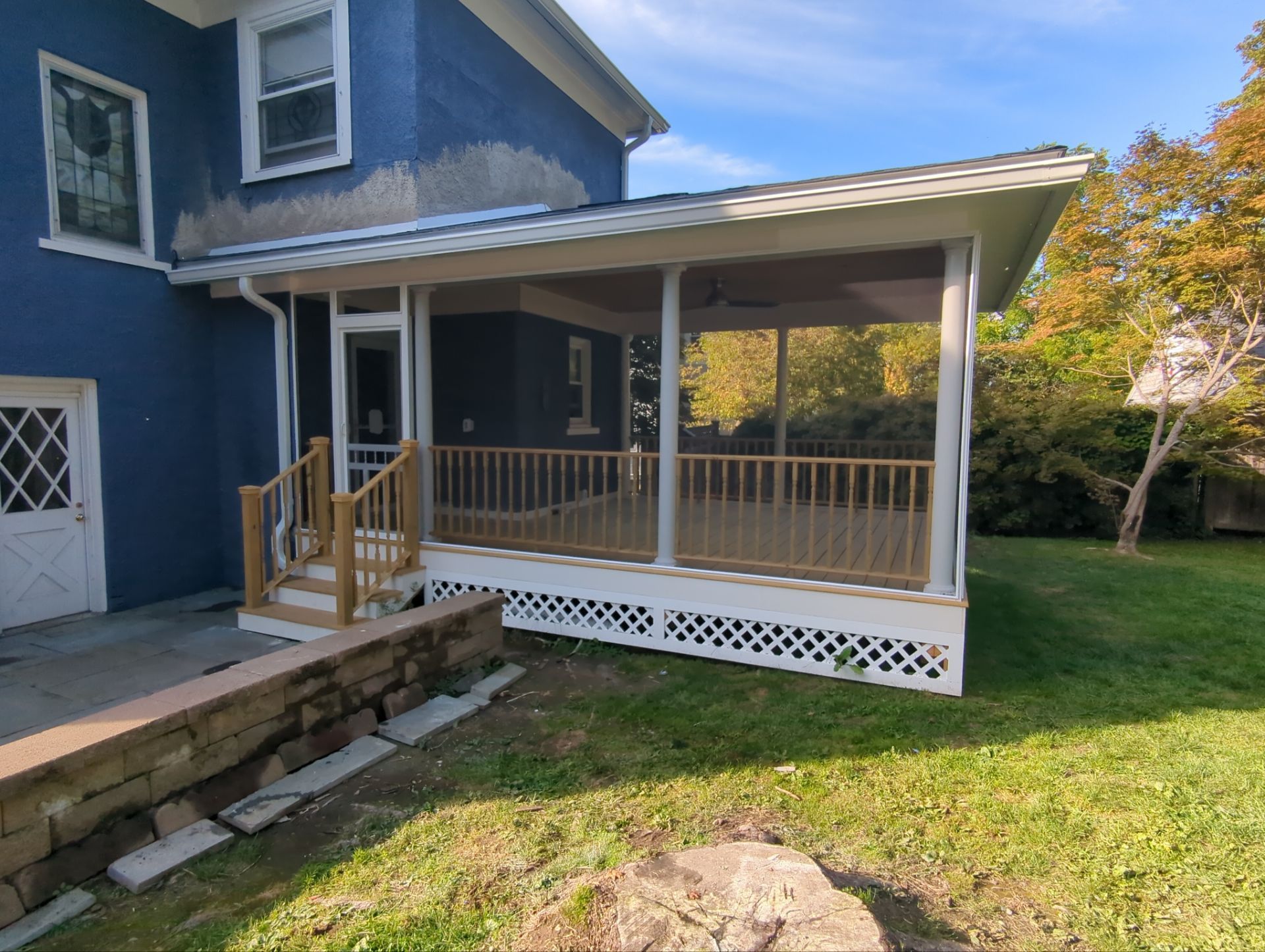Screened porch addition with architectural columns and a hip roof in Pittsfield, MA